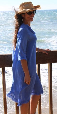 This dress is versatile and easy to use. Perfect for the beach or any other informal occasion. 75% linen 25% Cotton Made in Italy One Size Fits Most Model is 5'8 Spring Linen Beach Dress For Day Out, Linen Beach Dress For Spring Day Out, Spring Day Out Linen Beach Dress, Blue Linen Summer Dress For Vacation, Casual Linen Dress For Vacation, Casual Ramie Linen Dress For Vacation, Short Sleeve Ramie Dress For Vacation, Vacation Dress With Short Sleeves In Ramie, Beach Season Linen Dress For Day Out