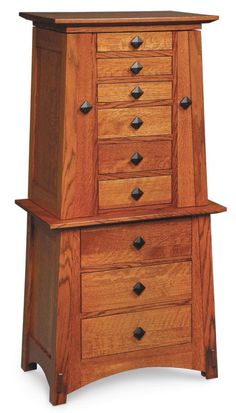 a wooden cabinet with drawers on top of it