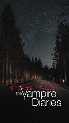 the vampire diaries poster with trees and stars in the sky above it, on a dark road