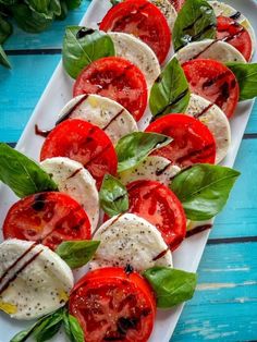 Layers of tomato mozzarella and basil drizzled with balsamic on a white serving platter Profusion Curry, Peach Caprese Salad, Peach Caprese, Italian Salad Recipes, Caprese Salad Recipe, Peach Recipes, Summertime Recipes, Layered Salad