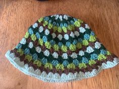 Bucket hat, keep your head warm this winter Winter Crochet Bucket Hat, One Size, Winter Crochet Bucket Hat One Size, One Size Winter Crochet Bucket Hat, Green Crochet Hat With Short Brim For Winter, Green Short Brim Crochet Hat For Winter, Green Warm Brimmed Hat, Warm Green Brimmed Hat, Different Shades Of Green, Art Textile