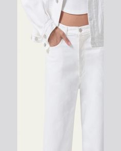 AGOLDE wideleg jeans in white nonstretch denim     Fivepocket style    Low rise    Relaxed, baggy fit    Full length    Button/zip fly; belt loops    Cotton    Imported High-rise White Jeans With Belt Loops, High Rise White Jeans With Belt Loops, White High Rise Jeans With Belt Loops, White Straight Leg Jeans With Belt Loops, White High Waist Jeans With Pockets, White Jeans With Belt Loops For Spring, Trendy White Straight-leg Jeans, White Cropped Leg Jeans With Belt Loops, White High-waisted Wide Leg Pants With Pockets