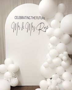 white balloons are in front of a sign that reads celebrating the future mr and mrs rose