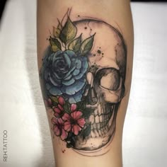 an image of a skull with flowers on it's leg and the caption below