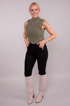 The versatility of the Inner Beauty Top knows no bounds! Crafted from luxurious chenille fabric, this trendy top offers the perfect balance of elegance and casual chic. The mock neck adds a touch of sophistication, while the cropped sleeveless design keeps you cool and confident. Unlined, knit, semi-sheer, and lightweight for a comfortable fit. 100% Polyester Hand Wash Cold, Line Dry Colors may vary with different viewing devices. Chic Green Crop Top For Fall, Chic Green Turtleneck Top, Chic Green Crop Top, Trendy Top, Chenille Fabric, Inner Beauty, Keep Your Cool, Trendy Tops, Mock Neck