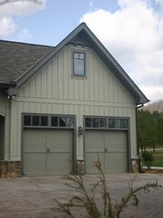 an image of a house with two garages