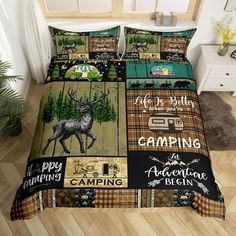 the bed is decorated with an image of a deer and campers'names on it