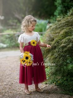 Sunflower Tulle dress. This beautiful dress is perfect for any special occasion. For a wedding, flower girl, junior bridesmaid, family pictures, a birthday party, and more. Lots of tulle colors available along with long sleeve, short sleeve, and sleeveless. find them all in my shop on Etsy. https://www.etsy.com/shop/LisaAnnsCreations Maroon Sunflower Wedding, Burgandy Sunflowers Wedding, Sunflower And Red Wedding, Sunflower Rose Wedding Theme, Maroon And Sunflower Wedding, Maroon And Yellow Wedding, Rose And Sunflower Wedding Theme, Sunflower And Burgundy Wedding, Burgundy And Yellow Wedding