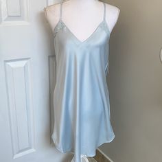 100% Polyester Hand Wash Purchased At Bloomingdale’s Nwt Elegant Blue V-neck Sleepwear, Elegant Light Blue Summer Sleepwear, Spring Satin V-neck Chemise, Feminine Blue Nightgown For Spring, Blue Satin Summer Sleepwear, Light Blue V-neck Sleepwear For Spring, Elegant Light Blue Sleepwear For Loungewear, Elegant Blue Nightgown For Summer, Elegant Blue Summer Nightgown