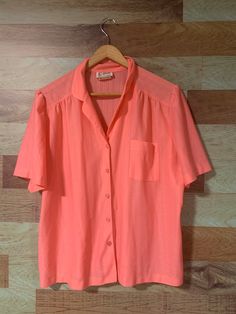 "D'Alliards pink button up blouse  💯 % polyester  Made in Canada  Box fit  Minor snag as per pics  Size 18 please see measurements for sizing all measurements are taken while item is laying flat  Neck 7\" Pit to pit 24\" Length 23\" Sleeve 10\" Any questions just ask!  Shipping is included in purchase price.  Vintage item, regular wear due to age should be expected.  Any known flaws/marking will be listed. No returns / exchanges but please advise if there is an issue with your item" Vintage Blouses, Womens Blouses, Button Up Blouse, Closet Fashion, Plaid Blazer, Green Plaid, Blouse Vintage, Silk Shirt, Colorful Fashion