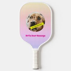 a paddle with a dog's face on it