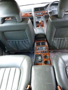 the interior of a car with leather seats