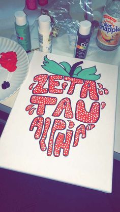 a paper plate with the words eat taco trip on it next to some crafting supplies