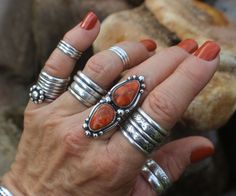 "APPLE CORAL RING --- handcrafted in oxidized STERLING SILVER --- Multi-Stone Rings for Her BIG RINGS FOR WOMEN --- Orange Colored Jewelry SIGNED AND DATED ARTISAN MADE US WOMEN'S SIZE 7  BAND STYLE: OPEN STYLE three (3) ridge handmade sterling silver band (BS1). Band is approximately .25\" wide.  This width is important when considering size as I do not offer re-sizing. FACE OF THIS WESTERN STYLE TWO STONE RING IS APPROXIMATELY:  1.7\" Long .6\" Wide NOTE: The only item included in this sale is the Cowgirl Style / Hippie Chic TWO STONE Apple Coral Ring.  The single stone jasper ring IS NOT included in this sale.  Cabochons may or may not include backing. Gemstones may include natural inclusions. Jewellery is handmade in a freeform style with basic silversmithing tools and has been oxidize Turquoise Stone Rings, Western Style Rings, Cowgirl Rings, Big Rings For Women, Cabochon Rings, Silversmith Rings, Western Rings, Two Stone Ring, Navajo Turquoise Jewelry