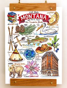 the montana state map is hanging on a wooden frame with wood pegs and hooks