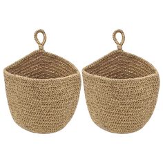 two round baskets with handles on each side, one is brown and the other is beige