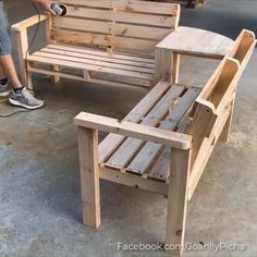 a man is sanding up some wood furniture