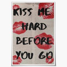 the words kiss me hard before you go are painted on an open book with red lipstick