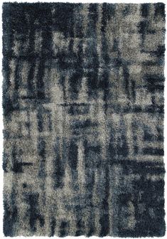 a gray and black rug with squares on it