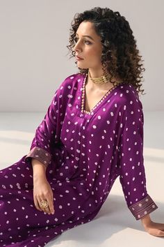 Purple tie-dye kurta with bandhani patterns and sequin embellishments. Comes with pant. - Aza Fashions Festive Bandhani Print V-neck Set, Festive V-neck Bandhani Print Sets, Festive V-neck Sets With Bandhani Print, Bohemian Bandhani Print Kurta For Diwali, Bohemian Kurta With Dupatta For Puja, Bollywood Bandhani Print Kaftan For Eid, Bohemian Bandhani Print Set For Eid, Bollywood Style Eid Kaftan With Bandhani Print, Bohemian Bandhani Print Kurta For Transitional Season