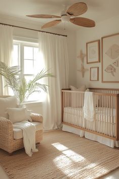 a baby's room with a crib, chair and window