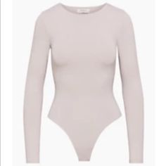 a women's bodysuit with long sleeves and no bras on the chest