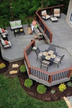 an aerial view of a deck with patio furniture