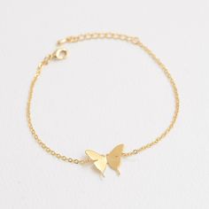 "These personalized butterfly bracelets will be perfect thank you gifts for your wedding, anniversaries, and birthdays. You can also gift these to your best friends, bridesmaids and sorority sisters! Great minimal bracelets for layering or for easy, everyday wear. D E T A I L S - Delicate Initial Butterfly charm - Butterfly Size: 13mm x 17 mm - Hand-Stamped Initial of your choice - We can stamp Uppercase letters, numbers,♡ (heart) - Available in Gold, Rhodium, or Rose gold Plated - This listing Dainty Adjustable Jewelry With Butterfly Clasp, Butterfly Clasp Bracelets For Gift, Elegant Adjustable Bracelets With Butterfly Charm, Dainty Silver Butterfly Bracelets, Silver Dainty Butterfly Bracelets, Dainty Butterfly Charm Bracelets As Gifts, Dainty Butterfly Charm Bracelet Gift, Dainty Butterfly Charm Jewelry For Wedding, Dainty Wedding Jewelry With Butterfly Charm