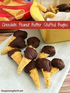 chocolate peanut butter stuffed bubblys on a towel next to bananas and other snacks