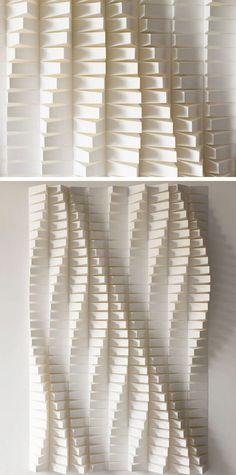 three different views of the wall made out of strips of white paper with wavy lines