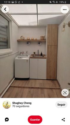 a small kitchen with white appliances and wood flooring on the walls is shown in an instagram