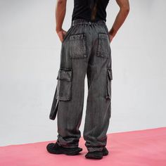 The Heavily Ripped Stripe Denim Cargo pants bring a bold and rugged edge to any wardrobe, combining avant-garde style with impeccable craftsmanship. Featuring a washed and distressed finish, these cargos are adorned with heavy ripping and tear details on the front for a striking, worn-in look. Satin stripes run down each side, adding a unique contrast to the denim. With a multi-pocket design, these pants are both functional and stylish. Made from premium 100% cotton fabric, they offer a slightly Sneakers And Socks, Denim Cargo Pants, Denim Cargo, Half Shirts, Jean Accessories, Avant Garde Fashion, Pocket Design, Jeans Pants, Distressed Denim