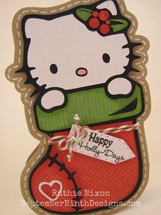 a hello kitty card with a tag attached to it