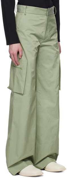 Nylon canvas cargo pants. · Belt loops · Three-pocket styling · Zip-fly · Zip pocket at outseams Supplier color: Eggshell Spring Green Parachute Pants, Green Cargo Pocket Parachute Pants For Spring, Spring Green Cargo Pants With Flap Pockets, Green Cargo Pants With Flap Pockets For Spring, Green Parachute Pants With Cargo Pockets For Spring, Urban Green Parachute Pants With Multiple Pockets, Khaki Parachute Pants With Multiple Pockets For Spring, Spring Khaki Parachute Pants With Pockets, Urban Green Parachute Pants With Cargo Pockets