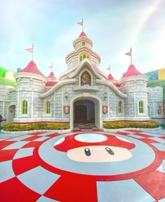 the entrance to mickey mouse's castle is painted red and white