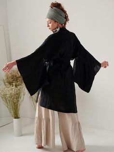 Long linen kimono with pockets and belt Kimono is made of curled soft linen in black We sew them in one size The model in the picture is 171 cm tall Kimono dimensions measured flat: width in bust / waist / hips 65 cm Kimono length about 98 cm sleeve length (measured from the neck) 58 cm Strap length 2,30 m Material: linen 100% weight 150 Belt Kimono, Kimono Boho, Linen Kimono, Black Kimono, Festival Clothing, Boho Kimono, Long Kimono, Style Expert, Women's Costumes