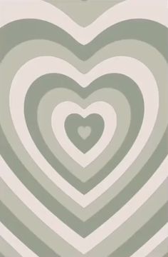 a heart - shaped pattern in shades of green, white and grey on a gray background