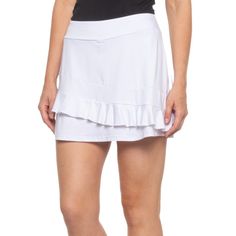 Stay Cool When The Game Heats Up In This Kyodan Tennis Asymmetrical Ruffle Skort, Crafted From Wicking, Fast-Drying Stretch-Knit Fabric With A Movement-Friendly Fit. -Soft And Stretchy Knit Fabric With Asymmetrical Ruffle Trim At Hem -Moisture Wicking And Fast Drying -Flat Waistband Won't Roll Or Dig Into Side -Stretch Knit Attached Shorts For Added Coverage And Comfort -Chafe-Free Flat Seams -Fabric: 88% Polyester, 12% Spandex White Ruffle Hem Skort For Summer, Elegant Asymmetrical Hem Skort For Summer, Fitted Summer Skort With Asymmetrical Hem, Fitted Skort With Asymmetrical Hem For Summer, Spring Skort With Asymmetrical Hem, White Bottoms With Ruffles And Asymmetrical Hem, White Stretch Skort With Ruffles, Navy Tennis Skirt, Ruffle Skort