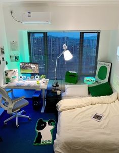 a bed room with a neatly made bed and a desk in front of a window