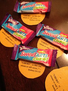 four candy bars sitting on top of a table