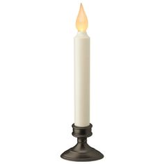 a white candle is lit on a black stand