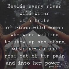 two women holding their hands up in the air with a quote above them that reads, beside every rien wild woman is a tribe of