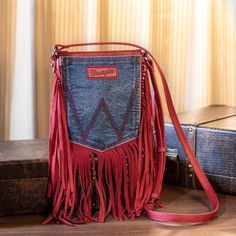 Red In Color Pu Leather Zipper Lining Leather Wrangler Pocket Crossbody Purse For Western Lifestyle. Boho Fringe Cross Body Purse Adopts The Signature Wrangler Jeans Hip-Pocket. Western Purse Is Crafted From A Denim And Vegan Leather Body, 100% Genuine Leather Fringe Crossbody Bag Measures 0.5"D X 7"W X 8.2"H (Adjustable Strap: 22"-25.5" Drop). Country Purse Includes A Side Zippered Pocket And An Open Pocket, A Zippered Pocket On The Back. As Always, I Ship Out The Same Or Next Day :) New To Pos Restyle Old Clothes, Fringe Handbags Purses, Upcycle Denim, Fringe Crossbody Purse, Leather Fringe Purse, Hip Purse, Embellished Purses, Denim Fringe, Leather Fringe Bag