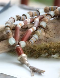 this is a necklace made with beads and wood