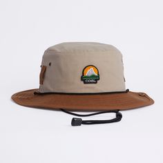 The Seymour is a super versatile boonie hat, perfect for fishing, camping, boating, or just hangin'. Made of a rich waxed canvas, with moisture wicking sweatband inside. Snaps up at both sides, with belt loops at side for attaching, and adjustable chin cord for a secure fit. Available in M: 58.5cm and L: 60.5cm Summer Camp Clothes, Camping Hats, Camping Hat, Adventure Hat, Tactical Hat, Lined Flannel Shirt, Boonie Hat, Outdoor Hat, Fisherman's Hat