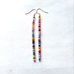 Colorful Boho Handmade Glass Seed Beaded Dangle Stick Earrings Finished With Gold Tone Hook Ear Wires Gypsy Hippie Retro Mod Nickel Free Gold Tone Hook Ear Wires With Clear Backs To Help Keep In Place Dainty Tiny Glass Seed Beads In Multi Colors, Randomly Chosen By Me To Create You A Beautiful Unique Pair Of Earrings Using The Same Bead Colors Yet Randomly Selected Approximately 3.25 Inch Length Handmade Beautiful Earrings To Wear Daily Or Give As A Gift For Christmas, Anniversary, Birthday, Val Glass Seed Bead Earrings, Minimalist Beaded Earrings, Mushroom Beaded Earrings, Simple Beaded Earrings, Dangle Beaded Earrings, Bullet Earrings, Sewing Creations, Beaded Things, Handmade Boho Jewelry