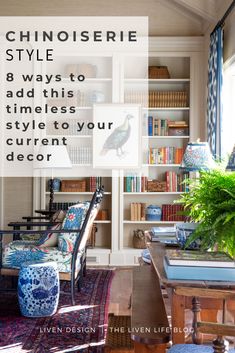 a living room filled with furniture and bookshelves covered in blue and white decor