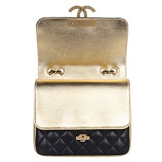 Authentic, pre-owned Chanel double flap quilted lambskin leather shoulder cross body bag in black. Features quilted leather with gold accent leather, gold hardware, a long gold chain strap with leather insert, front clasp closure. The interior features gold lambskin leather, double flap with snap closure, featuring large pockets with zipper and slip pocket. This bag is a Classic that you will love. Add your small cosmetic case, wallet, phone, keys, and more. Authenticity card and stamp read: 281 Chanel Double Flap, Black Features, Gold Accent, Quilted Leather, Cosmetic Case, Cross Body Bag, Flap Bag, Lambskin Leather, Body Bag