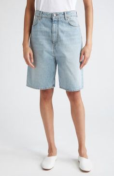 A low-rise waist and longline silhouette define nonstretch denim shorts crafted from organic cotton with a logo-embossed back patch. 8 1/2" inseam; 22" leg opening; 15" front rise; 16 1/2" back rise (size 29) Zip fly with button closure Front slant pockets; back patch pockets 100% organic cotton Machine wash, dry flat Made in Italy Designer Clothing This brand has B Corp certification, representing business practices with emphasis on social and environmental performance, accountability and trans Classic Jean Shorts With Five Pockets, Classic Five Pocket Jean Shorts, Classic Mid-rise Denim Shorts, Denim Knee-length Shorts With Belt Loops, Relaxed Fit Recycled Denim Shorts, Light Wash Shorts With Five Pockets, Classic Light Wash Short Length Bottoms, Relaxed Fit Knee-length Jean Shorts, Classic Denim Shorts With Five Pockets