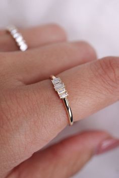 Stacking Ring Fashion Emerald Cut Baguette Diamond Stackable Rings, Stackable 14k Gold Baguette Cut Diamond Ring, Elegant 14k Gold Baguette Cut Stackable Rings, 14k Gold Baguette Cut Stackable Rings, Elegant Stackable Rings With Baguette Diamonds, Timeless 14k Gold Stackable Rings With Baguette Cut, Modern Everyday Diamond Ring With Baguette Diamonds, Modern Stackable Emerald Cut 14k Gold Rings, Modern 14k Gold Emerald Cut Stackable Rings